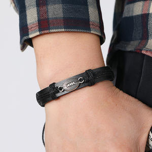 Bracelet <span class=keywords><strong>de</strong></span> <span class=keywords><strong>sport</strong></span> <span class=keywords><strong>Sac</strong></span> en cuir <span class=keywords><strong>Rugby</strong></span> Football américain Cadeaux pour filles garçons Bracelet réglable adulte Parfait pour cadeau <span class=keywords><strong>de</strong></span> <span class=keywords><strong>sport</strong></span> Noir - Product Image 1