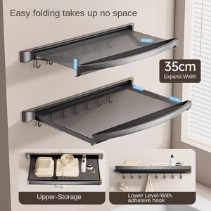 Moderno Estante de Almacenamiento de Baño Telescópico Plegable Invisible y Ecológico, Montado en la Pared, con Orificios para Colgar Toallas y Ropa - Product Image 1