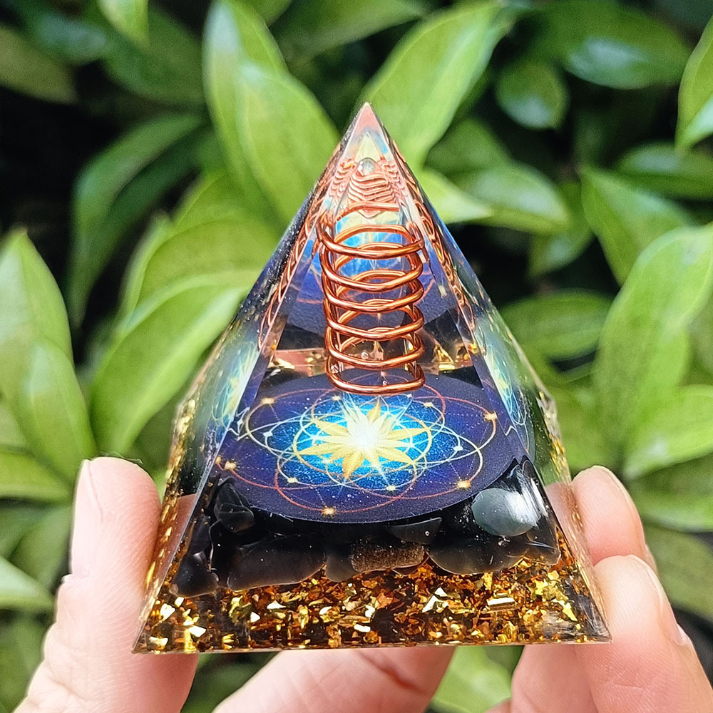 Pilar de cristal transparente con flores azul obsidiana.