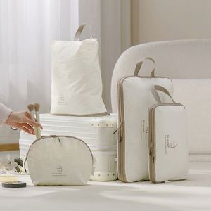 Wholesale 4pcs/set Compressible Travel Packing Organizer Carry Suitcase Bags <b>Wardrobe</b> Compressible Clothes Quilt Organizing Bag - Product Image 5