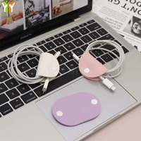 Mini enrouleur de câbles en cuir PU de forme ovale, organisateur de cordons couleur macaron, attache-câbles réutilisable pour la maison et les voyages quotidiens (vente en gros)
