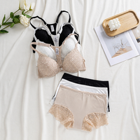Ensemble soutien-gorge et culotte deux pièces brodé noir en dentelle florale sans couture avec sangle ajustable, personnalisable avec logo, haute qualité, vente en gros