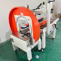 Machine à cerclage semi-automatique pour boîtes en carton, machine industrielle horizontale de cerclage à ruban pour l'emballage des boîtes