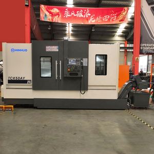 Torno de cama inclinada CNC equipado con subhusillo para Mecanizado simultáneo en ambos extremos - Product Image 6