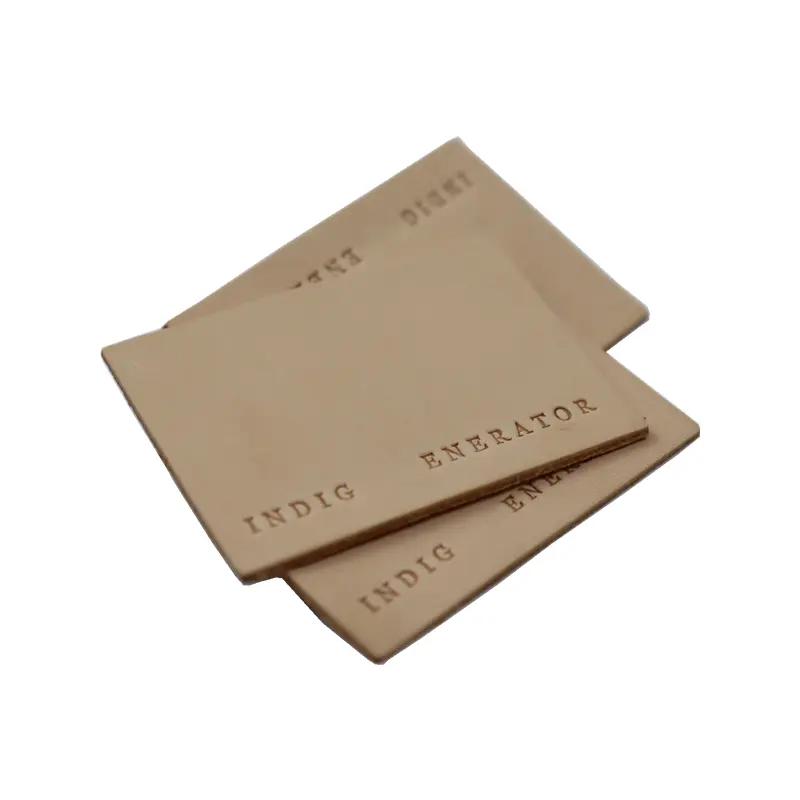 Özel üretim kot deri yamalar kabartmalı marka hakiki kahverengi deri etiket yama giysi etiketi boyutu giysiler için etiket