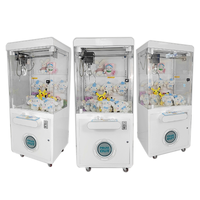 Machine à griffes pour monnaie et pièces de monnaie canadienne personnalisée pour petits jouets en peluche et grandes poupées Machine de jeu de grue à pièces Centres de jeu