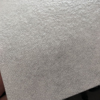 Entoilage rigide en polyester 100% de haute qualité pour draperie de rideau élastique soluble dans l'eau avec feutre adhésif à fonction fusible