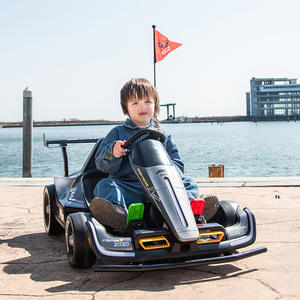 รถโกคาร์ทไฟฟ้าสำหรับเด็ก รุ่น Karting 2030 แรงดัน 12V พร้อมรีโมทคอนโทรล ของเล่นรถยนต์สำหรับเด็ก ขับขี่ได้ สนุกกับการแข่งรถกลางแจ้ง - Product Image 1