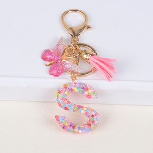 Venta al por mayor nueva moda colorida lentejuelas mariposa borla regalos para niñas mujeres Rosa acrílico 26 letras iniciales en inglés llaveros - Product Image 2
