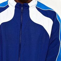 Survêtement de jogging en nylon réfléchissant 2 pièces avec logo personnalisé OEM/ODM, coupe-vent en nylon pour hommes avec bandes de finition blanches