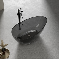 Baignoire autoportante de luxe à surface solide en forme d'oeuf Résine transparente de massage à l'air Résine transparente noire trempage pour hôtel