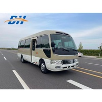 Mini-bus Coaster d'occasion 20 places Euro 4 Essence Transmission manuelle Fourgonnette de transport de passagers d'occasion