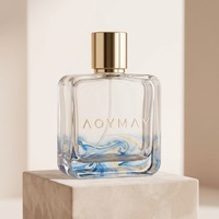 Flacon de parfum en verre transparent cylindrique haut de gamme personnalisé avec capuchon argenté, 50 ml, 100 ml