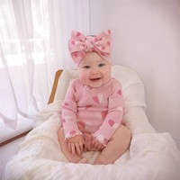 Combinaison en tricot pour bébé pour la Saint-Valentin, pull jacquard en forme de cœur, 100% coton biologique, combinaison à bretelles, jambes à volants, barboteuse pour fille, tricot