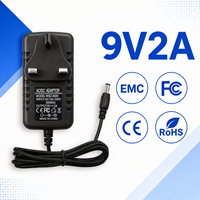 Adaptateur secteur AC/DC 9V 2A 18W avec prise UK, protection contre la surchauffe, style prise murale, pour bandes LED et caméras PTZ, production personnalisée