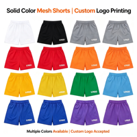 Shorts de basketball personnalisés pour hommes en maille respirante Spandex/Polyester avec logo imprimé par transfert thermique sur le devant et cordon de serrage OEM/ODM