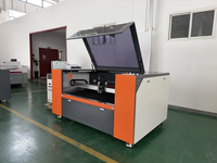 Machine de découpe laser mixte fermée, sources laser double fibre 1200W et CO2 130W pour métaux et non-métaux, une machine pour tout faire
