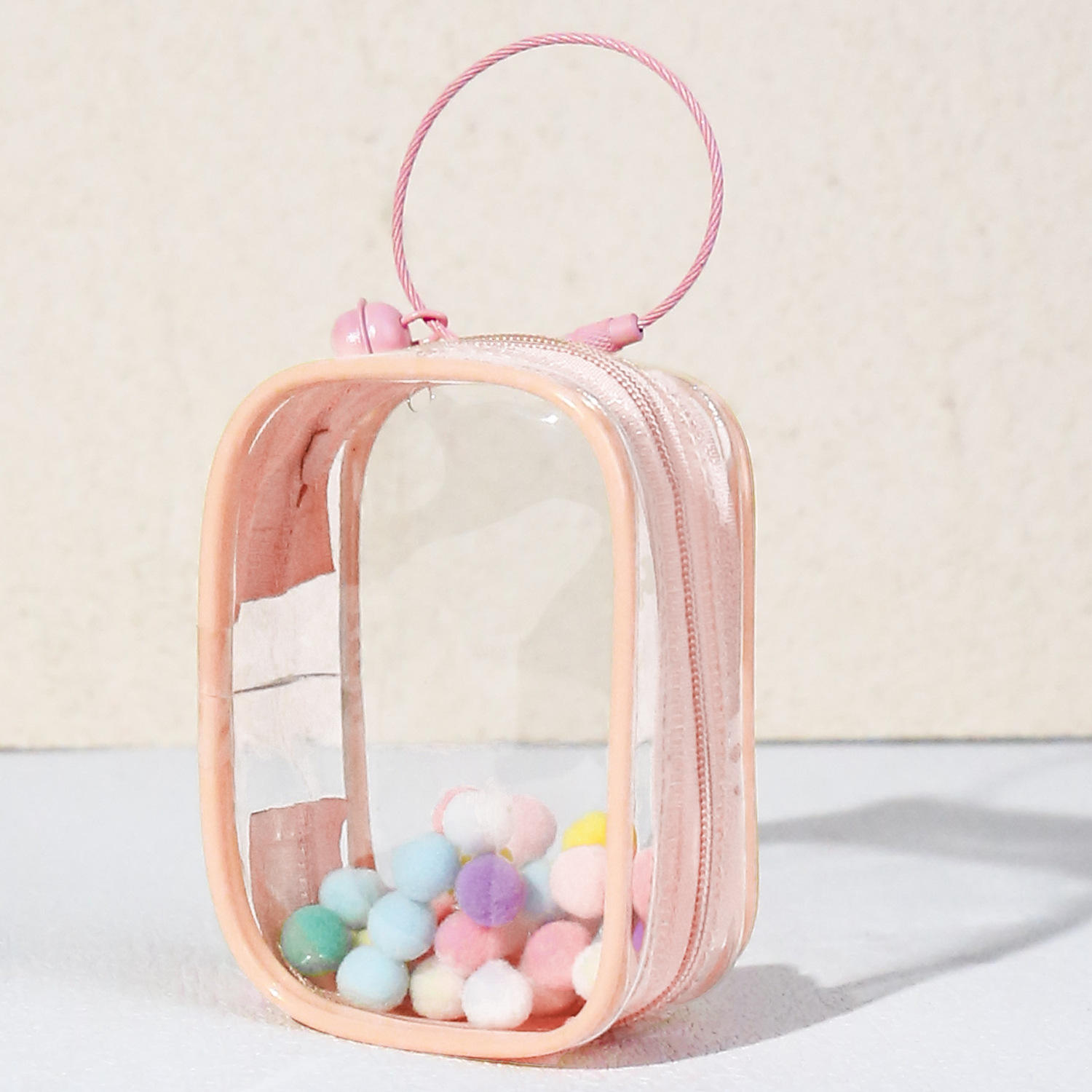 Rosa-Cuadrado-campana con anillo y POM-POM