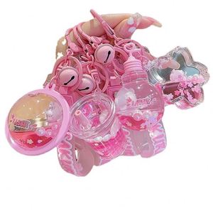2024 New Cartoon Pendant Custom Keyrings Snowflake Sakura Sequins Promotional Backpack Oil <b>Floating</b> Liquid Acrylic Keychain - Product Image 3