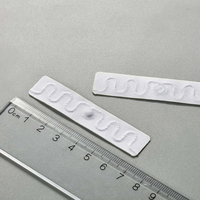 Alta temperatura impermeable UHF RFID Etiqueta de lavandería Mini Etiqueta de tela textil lavable interfaz de comunicación NFC 860-960MHz