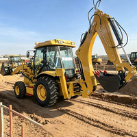 Chargeuse-pelleteuse haute performance 388 avec moteur diesel Cummins, 4 roues motrices, hydraulique, pour chantier de construction, dotée d'une capacité de charge élevée