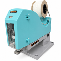 Attacheuse de crochets en plastique haute efficacité Booster G9500 pour la fixation des étiquettes de vêtements, machine à crochets en plastique pour usine de confection