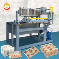 Chaîne de production complète de machines de moulage de pâte ORME intégrées et automatiques pour plateaux à œufs (500-4000-1000 PCS/H) à partir de déchets de papier