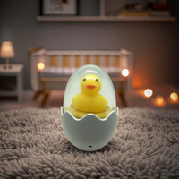 W033 Niedliche Cartoon-Ei-förmige Enten-Sensor-gesteuerte Steckdosen-Nachtlampe mit Kalt- und Warmweiß-LED für Kinderzimmer