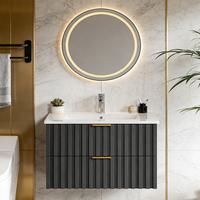 Meuble-lavabo mural de salle de bain 29-31 pouces avec vasque en céramique intégrée, tiroirs cannelés gris foncé, poignées dorées, miroir rond à LED