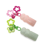 Bouteille porte-clés OEM personnalisée en forme de gourde, mini-récipient cosmétique mignon avec breloque papillon, ensemble flacon compte-gouttes violet et bouchon à bille
