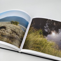 Servicios de impresión de libros de fotografía de tapa dura personalizados Impresión Offset Cartón Papel Kraft Cartón DE ARTE Formato de libro de paisaje