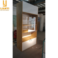 Vitrine d'exposition fonctionnelle pour lunettes en verre stratifié, design professionnel pour magasin d'optique