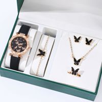 Nouvelle montre à quartz à bracelet numérique simple pour femmes avec bracelet en cuir à la mode et boîtier en alliage à cadran en verre