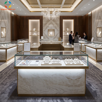 Vitrine à bijoux en verre trempé sur mesure avec éclairage LED chaud et système de verrouillage de sécurité pour magasins de détail et centres commerciaux