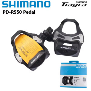 Pedales de Bicicleta de Carretera <span class=keywords><strong>SHIMANO</strong></span> PD <span class=keywords><strong>R550</strong></span> - Pedales Autoblocantes de un Solo Lado con Calas SM-SH11, Piezas Originales <span class=keywords><strong>Shimano</strong></span> - Product Image 1