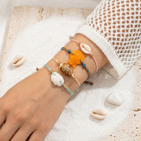 Ensemble de bracelets en cordon avec breloques coquillages tendance personnalisables, 4 pièces, perles dorées, réglables, cadeau pour femmes