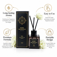 Diffuseur de parfum d'ambiance de luxe en verre noir avec logo personnalisé, décorations à pompons et bâtonnets en rotin – Fabrication en usine