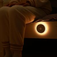 Lampe de nuit LED rechargeable par USB Design moderne Lampe de lit à rondelle Détecteur de mouvement émettant blanc chaud Interrupteur d'escalier automatique Usage domestique