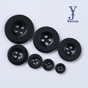 Yong Ji bottone in resina nera all'ingrosso della fabbrica ordine del cliente bottone rotondo in poliestere nero a 4 fori uso di molti colori per il cappotto