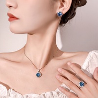 Ensemble de boucles d'oreilles et collier en spinelle bleue, trèfle à quatre feuilles, accessoires de mode féminins, nouveau, vente en gros, en cuivre, luxe léger