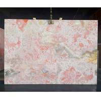 Carreaux de dalle d'onyx rose translucide naturelle pour comptoir de cuisine panneau mural villa décoration intérieure table basse escalier