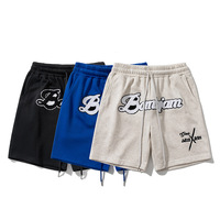 Shorts amples unis brodés tendance 300 g/m² unisexe, style hip-hop décontracté streetwear, en tissu peigné respirant et à séchage rapide pour l'été
