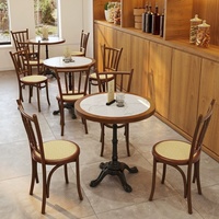 Ensemble de table à manger en ardoise avec structure métallique, style américain rétro, chaises en rotin et bois massif, mobilier de restaurant commercial de luxe