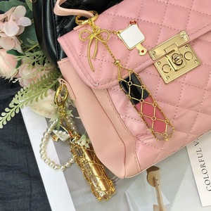 Nuevo y popular colgante de gatito de acero inoxidable, llavero <span class=keywords><strong>para</strong></span> bolso de malla con diseño de lápiz labial, DIY, personalizado, con forma de pentagrama de amor - Product Image 1