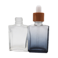Vente en gros de flacons compte-gouttes en verre rose dégradé de luxe avec bouchon en bambou pour huile essentielle cosmétique, sérum, 30 ml, 50 ml, 100 ml
