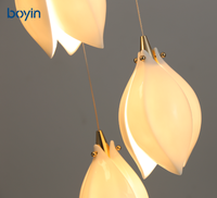 Lustre long de luxe en forme de fleur de magnolia, suspension nordique en porcelaine multi-têtes rotative pour escalier à plafond haut