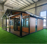 Conteneur mobile pliable à double aile Maison à chevrons Design moderne Respirant Boîte d'extension trois-en-un Atelier Bureau