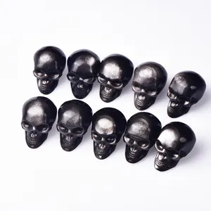 Wholesale hot sale crystal skulls High quality Hand-carved silver obsidian and obsidian skulls for Halloween decorations