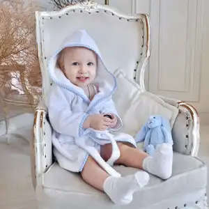 Monogram baby toddler dressing gowns white terry cotton with blue piping personalised luxury hooded bathrobe