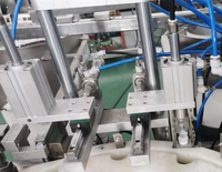 Machine automatique de remplissage et de bouchage de flacons roll-on cosmétiques pour déodorant corporel